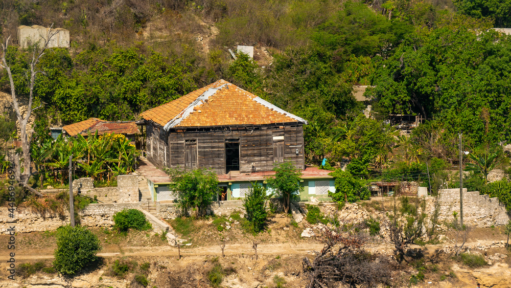 Wooden poor house near cuban city Santiago de Cuba