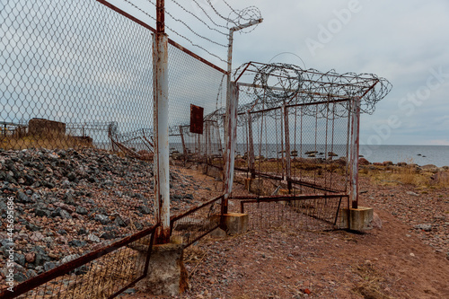 barbed wire on the fence in cloudy weather