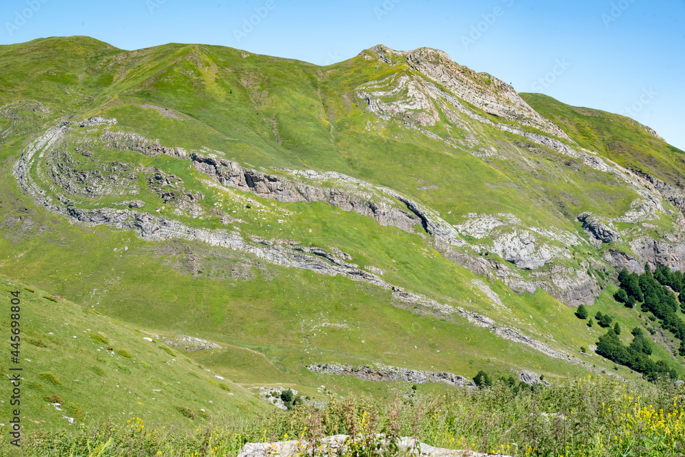 Fototapeta premium Meadows and mountains festivities in the Portalet mountain pass in the Aragonese Pyrenees bordering the French border