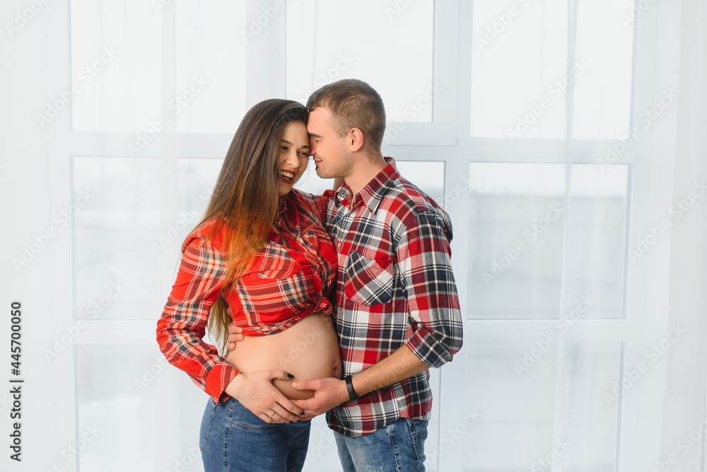 profile shot of pregnant wife and husband profile shot of pregnant wife and husband