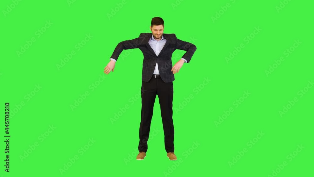Funny businessman make robot moves Formal adult business man boss perform robotic dance movements on a Green Screen, Chroma Key. Funny businessman make robot moves Formal adult business man boss perform robotic dance movements on a Green Screen, Chroma Key.