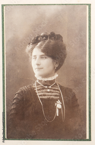old photo portrait of young woman photo