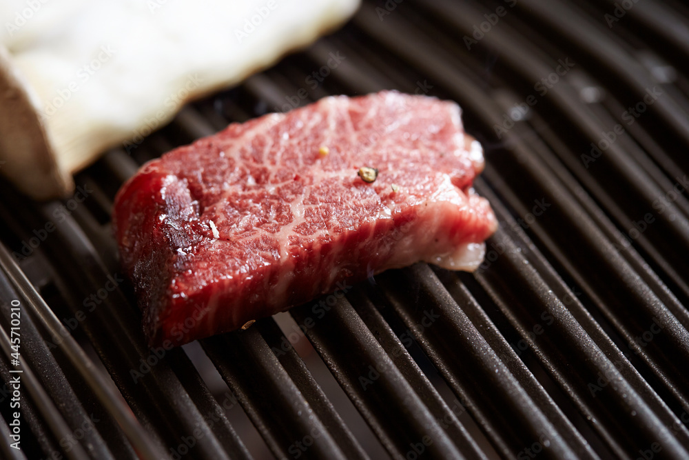 Grilled fresh raw beef on the grill