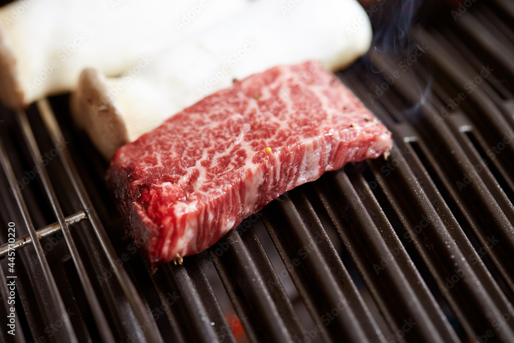 Grilled fresh raw beef on the grill Grilled fresh raw beef on the grill