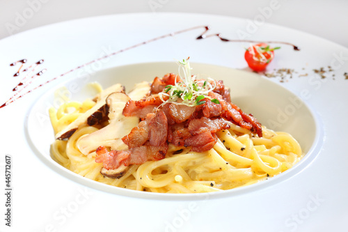cook pasta noodle with carbonara aglio olio sauce and seafood, bacon, mushroom muscle octopus western halal menu