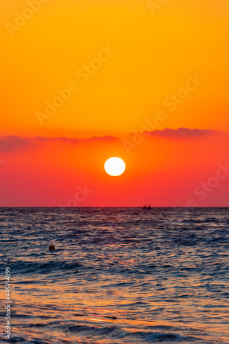Fototapeta Naklejka Na Ścianę i Meble -  The most beautiful colorful sunset at Ialysos Beach Rhodes Greece.
