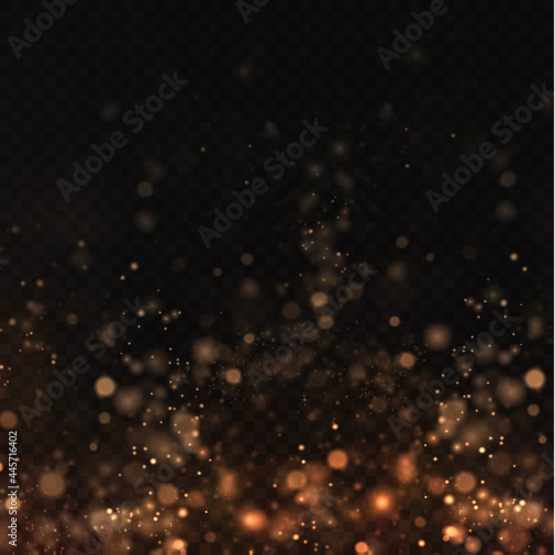 Christmas background of shining gold dust Christmas glowing bokeh confetti and spark overlay texture for your design. Glittering gold texture. Christmas effect for luxury greeting rich card. 