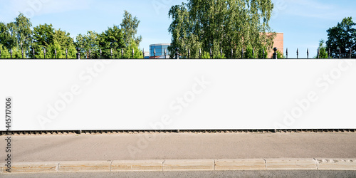 Advertising empty long white billboard with space for mockup information photo