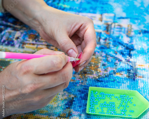 Diamond mosaic painting, Diamond mosaic, fragment of painting close-up, handmade hobby.