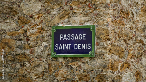 Typical French street sign in Paris, France reading 