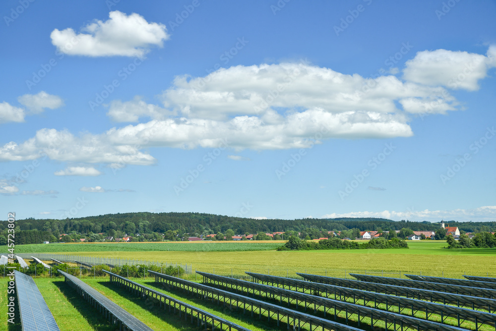 field with solar plants beside the highway, rural landscape germany