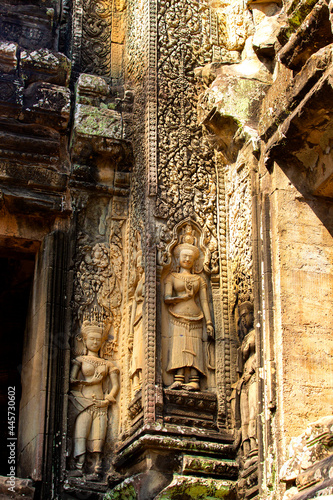 The engraved pattern around Angkor Wat belongs to the Khmer Empire. Located in the center of Angkor Thom