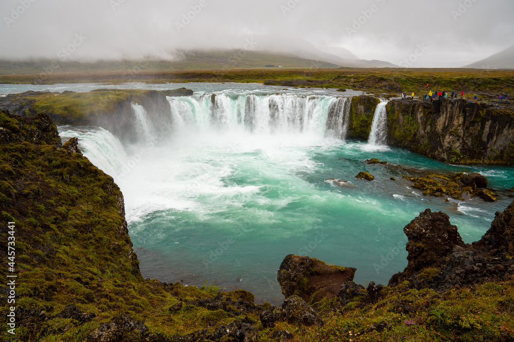The Godafoss Icelandic: Goðafoss waterfall of the gods, is a famous waterfall in Iceland. The Godafoss Icelandic: Goðafoss waterfall of the gods, is a famous waterfall in Iceland.