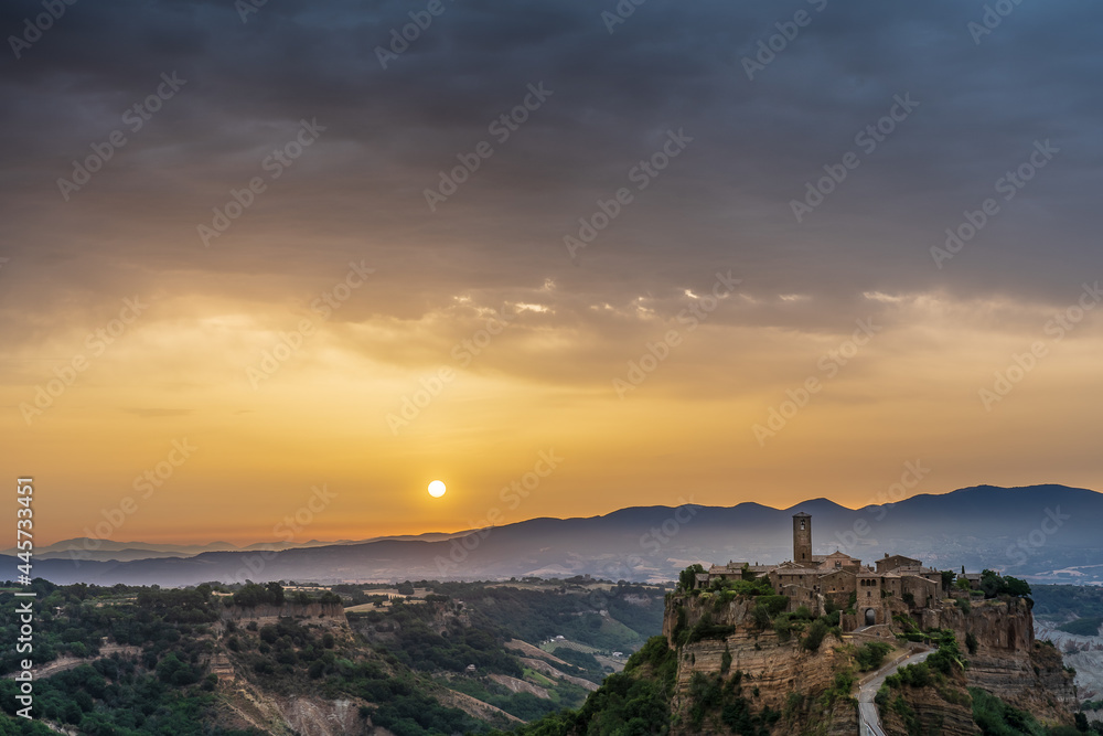 Civita di Bagnoregio, panoramic view at dawn. Archive photo.Civita di Bagnoregio, Europe, Italy, Lazio. Civita di Bagnoregio, panoramic view at dawn. Archive photo.Civita di Bagnoregio, Europe, Italy, Lazio.