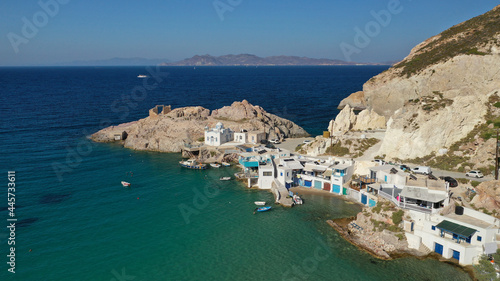 Aerial drone photo of famous traditional fisherman settlement of Firopotamos with colourful boat houses called sirmata, Milos island, Cyclades, Greece