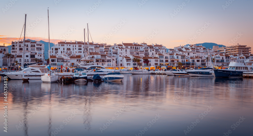 Luxury marina in Puerto Banus, Marbella at sunset. - obrazy, fototapety, plakaty 