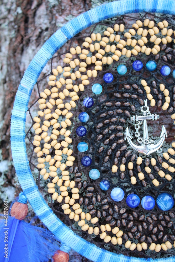 A beautiful dream catcher with natural stones. A beautiful dream catcher with natural stones.