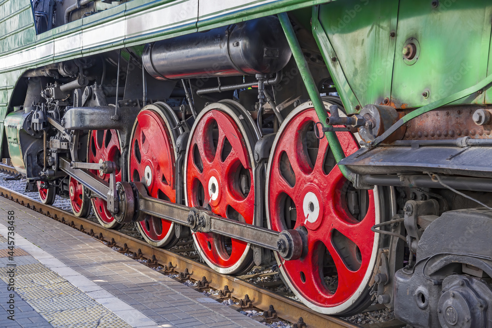 Green retro steam locomotive on the railway platform of the Rizhsky station. Moscow, Russia Green retro steam locomotive on the railway platform of the Rizhsky station. Moscow, Russia