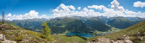 panorama lookout from Parsenn ridgeway to lake and tourist resort Davos, swiss alps