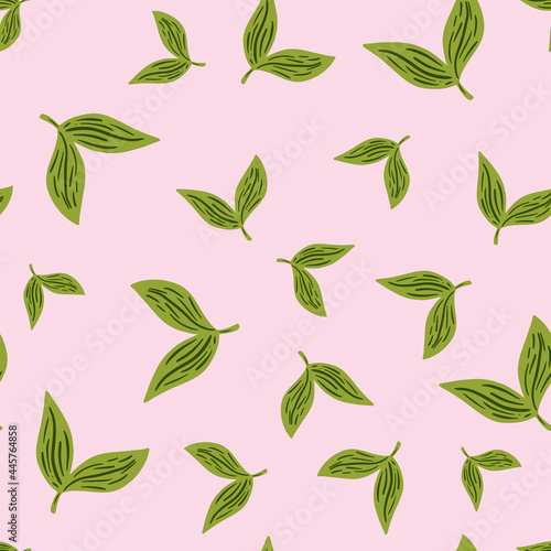 Floral seamless pattern with green random leaves silhouettes. Pastel pink background. Herbal print. © Lidok_L