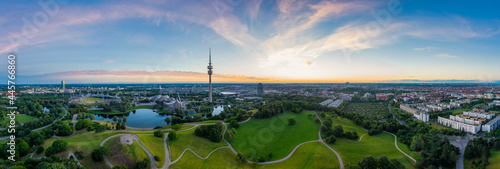 Idyllic view over Munich with some its popular landmarks at the Olympic Park with wonderful green parts combined with modern architecture.