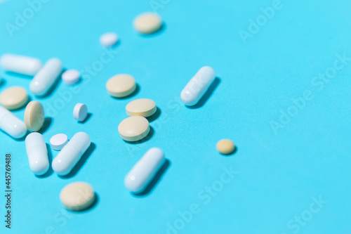 close up. various tablets on a blue background.