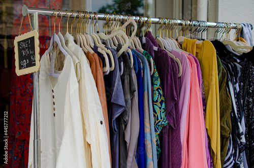 clothes in a shop, clothes hanger, vintage shop, thrift store © Megan