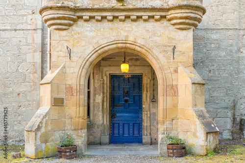 Ornamental Blue Door in a Stone Portico in a Scottish Castle, Scotland, U.K.