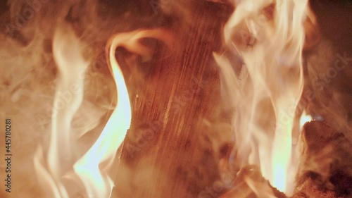 Close-Up Shot Of Warm Cozy Burning Fire In Fireplace. Slow Motion. Burning Wood.