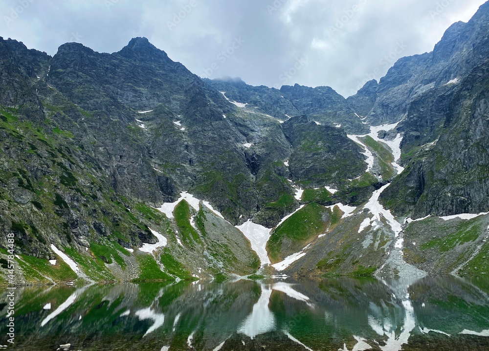 The Black Pond under Rysy. Polish Tatras, Poland - obrazy, fototapety, plakaty 