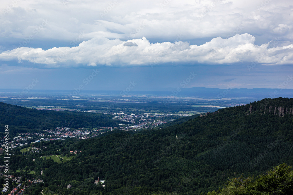 View in summer over Baden-Baden under cloudy skies, Black Forest, Germany