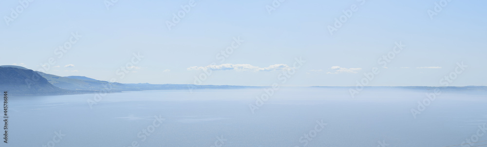 view of the sea and mountains in the morning