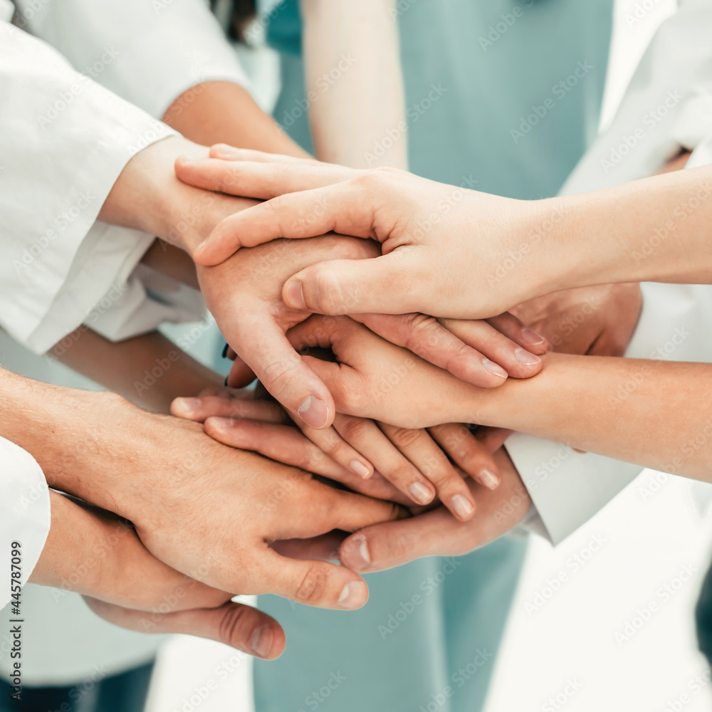 close up. a team of medics showing their unity. close up. a team of medics showing their unity.