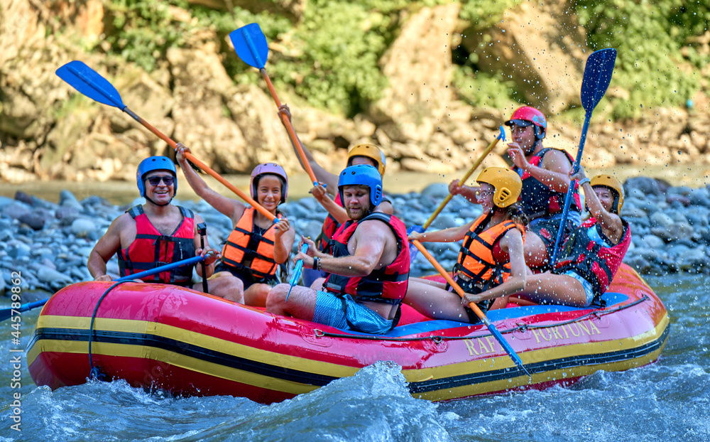 rafting on a large boat on a mountain river - obrazy, fototapety, plakaty 