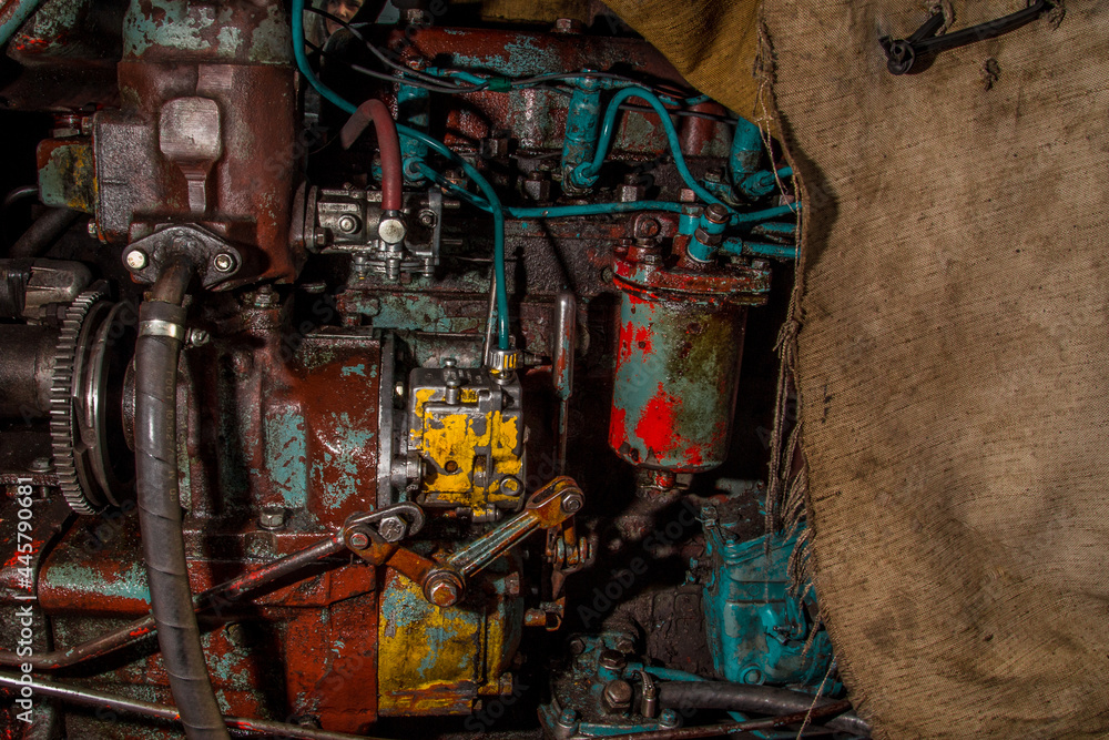 Naklejka premium Old colored tractor details macro