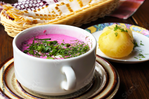  Cold beetroot soup with green onion, dill and hot potatoes.