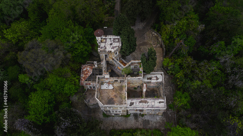 Aerial view of an abandoned old mansion called Dacha Kvitko, Sochi, Russia. Gloomy and scary uninhabited old house.