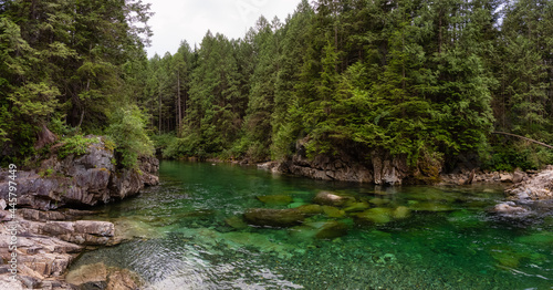 Panoramic View of the river in the Canadian Mountain Landscape. Cloudy Evening Sky. Golden Ears Provincial Park, near Vancouver, British Columbia, Canada.