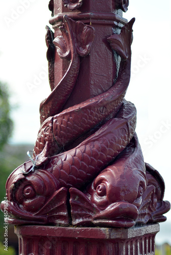 Entwined fishes detail from Victorian lamp standard