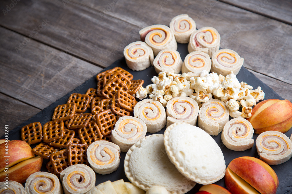 Fun kids snack tray with pretzels, fruit, sandwich rolls and more Fun kids snack tray with pretzels, fruit, sandwich rolls and more