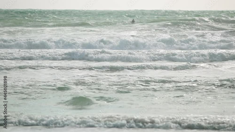 Beautiful sea waves breaks on a beach. Water waves surface. Blue energy and clear ocean water. Powerful stormy sea. Atlantic sea with foamy white texture. Environmental problems and climate change. Beautiful sea waves breaks on a beach. Water waves surface. Blue energy and clear ocean water. Powerful stormy sea. Atlantic sea with foamy white texture. Environmental problems and climate change.
