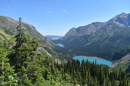 Three lakes (Lower Grinnel Lake, St Josephine Lake, and Swiftcurrent Lake) all seen from the top of a trail at Grinnel Glacier in Glacier National Park, Montana. 