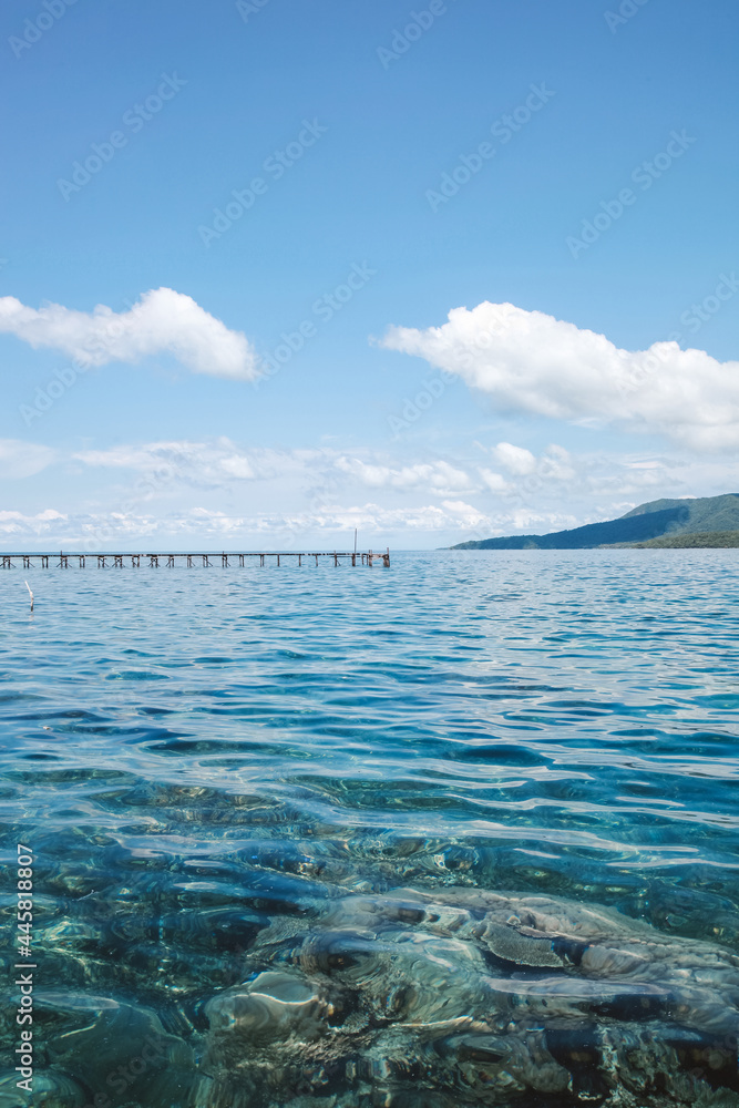 Beautiful sea scenery with clear and transparent water at Karimun Jawa so that the corals under the water are clearly visible