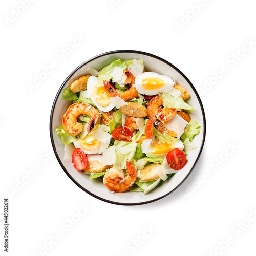 Fresh Shrimp Caesar Salad with parmesan cheese and Croutons. isolated on white background, top view