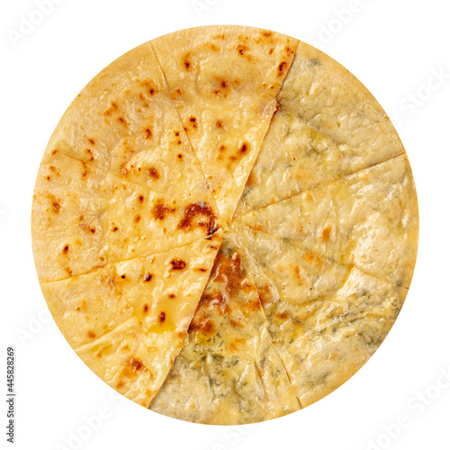 Isolated caucasian flat bread khychin with cheese and greens filling photo