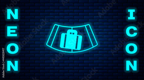 Glowing neon Airport conveyor belt with passenger luggage, suitcase, bag, baggage icon isolated on brick wall background. Vector