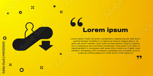 Black Escalator down icon isolated on yellow background. Vector