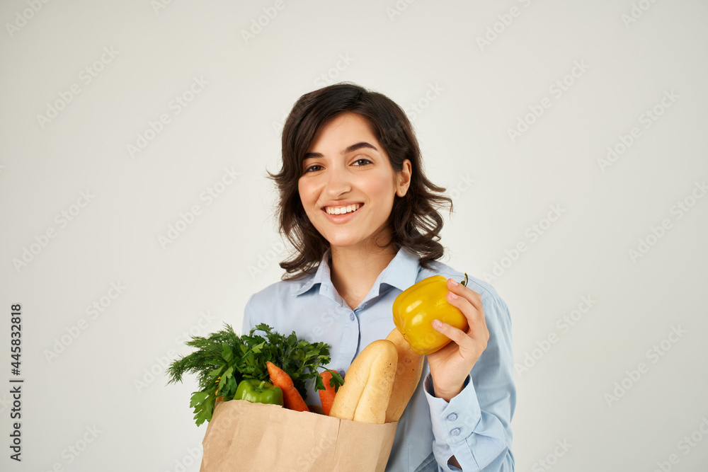 pretty brunette in blue shirt grocery bag organic food pretty brunette in blue shirt grocery bag organic food