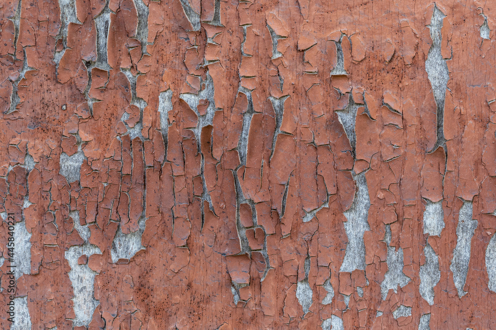 Wood texture with peeling flaking paint. Brown background