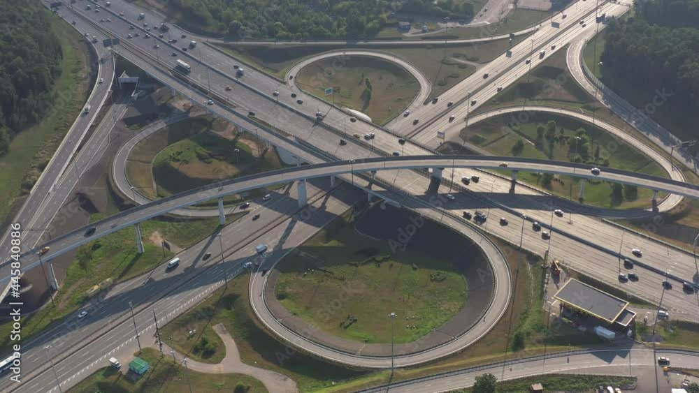 panoramic view of the motorway junction and fast moving cars filmed from a drone panoramic view of the motorway junction and fast moving cars filmed from a drone